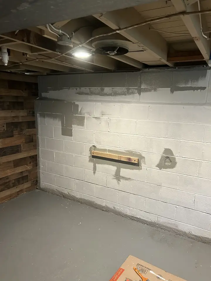 Patched basement block wall